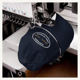 Gorra Fisterra CF Azul marino - detalle proceso de bordado en maquina